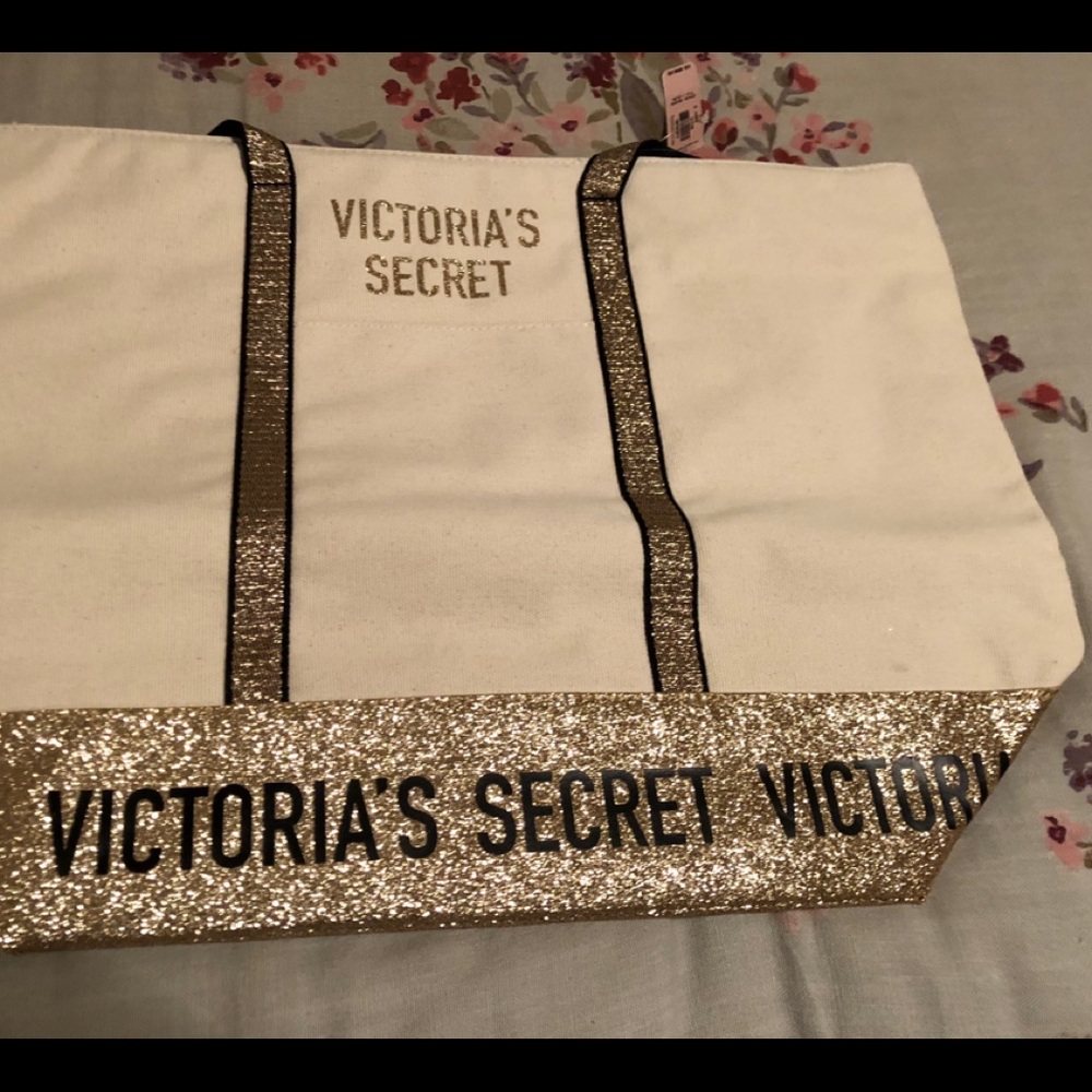 Victoria’s Secret gold glitter bag